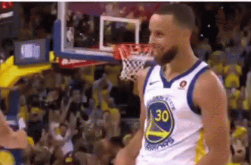 A Basketball Player Wearing A Jersey With The Number 30 On It GIF