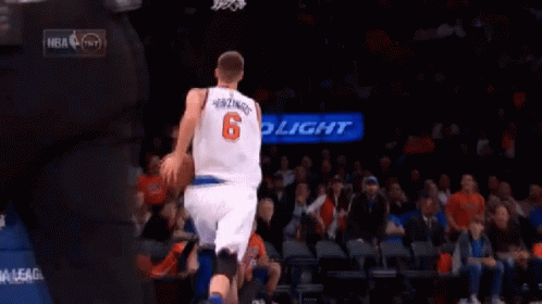 A Basketball Player Wearing A Jersey With The Number 6 On The Back GIF