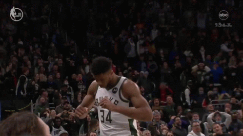 A Basketball Player Wearing A Jersey With The Word Bucks On It GIF