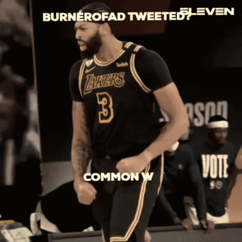A Basketball Player Wearing A Lakers Jersey Is Celebrating GIF