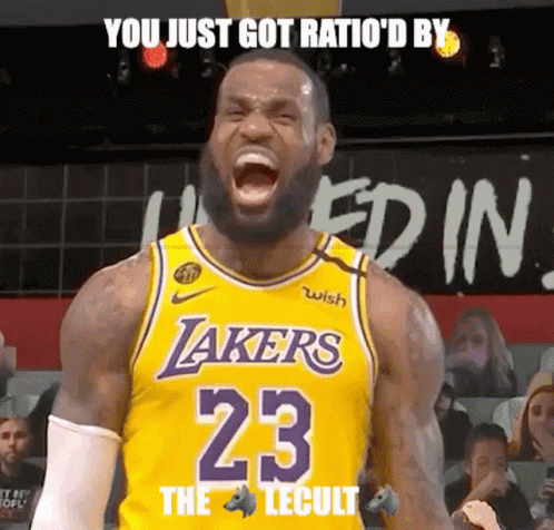 A Basketball Player Wearing A Lakers Jersey Is Screaming With His Mouth Open GIF