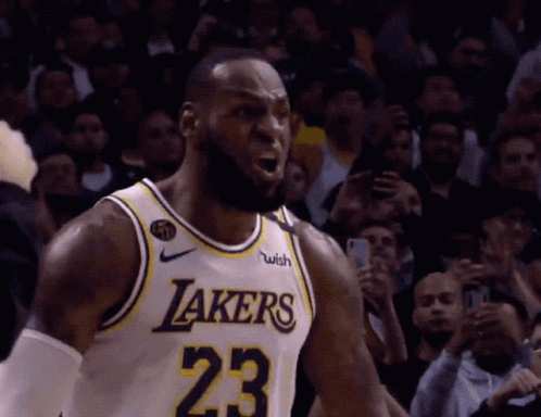 A Basketball Player Wearing A Lakers Jersey With The Number 23 GIF