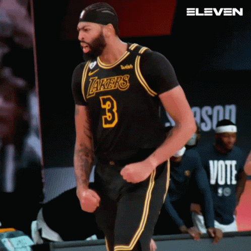 A Basketball Player Wearing A Lakers Jersey With The Number 3 On It GIF