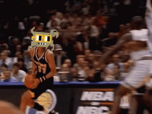 A Basketball Player Wearing A Mask With A Cartoon Face On It GIF