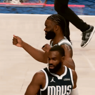 A Basketball Player Wearing A Mavs Jersey Giving A Thumbs Up GIF