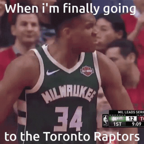 A Basketball Player Wearing A Milwaukee Jersey GIF