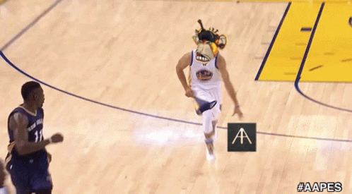 A Basketball Player Wearing A Monkey Head And Holding A Sign That Says Aapes GIF