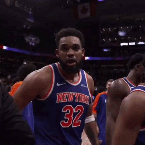 A Basketball Player Wearing A New York Jersey Giving The Middle Finger GIF