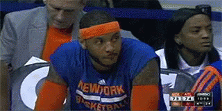 A Basketball Player Wearing A New York Jersey Sits On The Sidelines GIF
