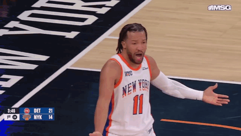 A Basketball Player Wearing A New York Jersey Stands On The Court GIF