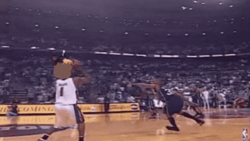 A Basketball Player Wearing A Number 1 Jersey Throws The Ball GIF