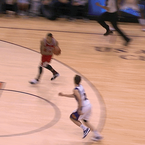 A Basketball Player Wearing A Number 23 Jersey GIF