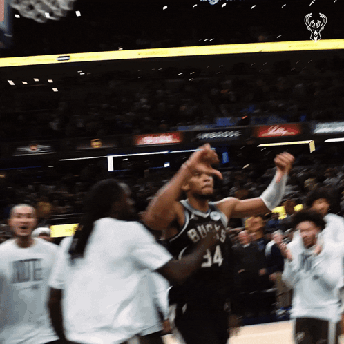 A Basketball Player Wearing A Number 34 Jersey GIF