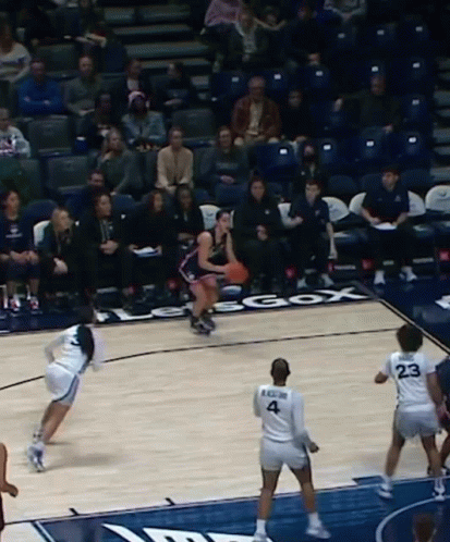 A Basketball Player Wearing A Number 4 Jersey GIF