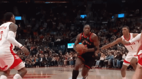 A Basketball Player Wearing A Number 7 Jersey Is Dribbling The Ball GIF