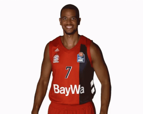 A Basketball Player Wearing A Red And Black Jersey With The Number 7 On It GIF