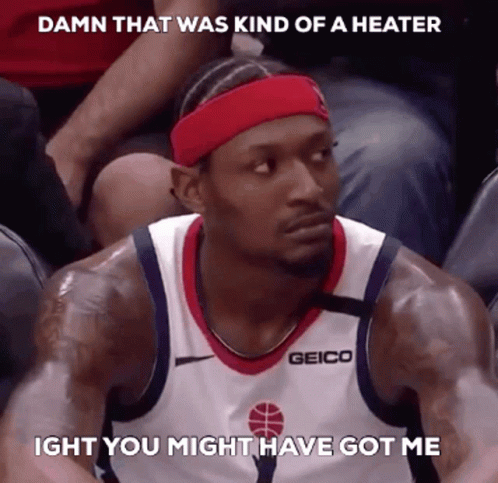 A Basketball Player Wearing A Red Headband And A Geico Jersey GIF