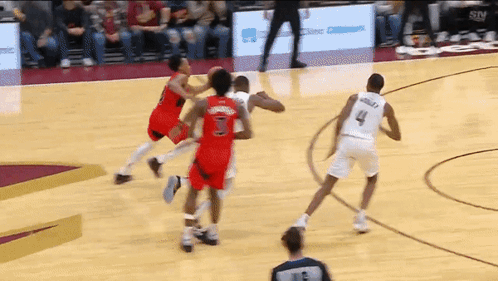 A Basketball Player Wearing A White Jersey With The Number 4 GIF