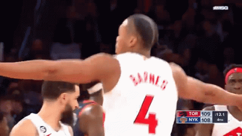 A Basketball Player Wearing A White Jersey With The Number 4 On The Back GIF