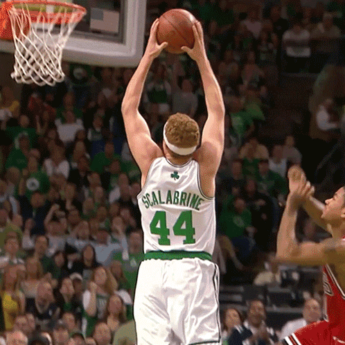 A Basketball Player Wearing A White Jersey With The Number 44 On The Back GIF