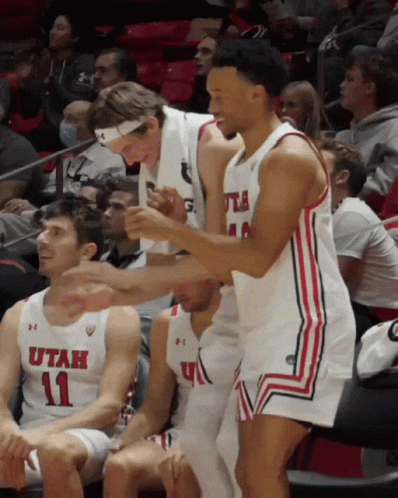 a basketball player wearing a white jersey with utah on it