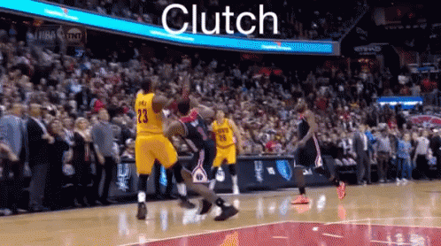 A Basketball Player Wearing A Yellow Jersey With The Number 23 On It Is Jumping In The Air GIF