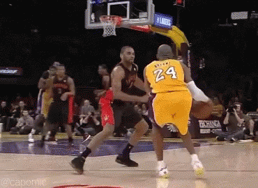 A Basketball Player Wearing A Yellow Jersey With The Number 24 GIF