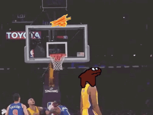 A Basketball Player Wearing A Yellow Lakers Jersey Stands In Front Of A Basketball Hoop GIF