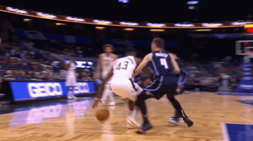 A Basketball Player Wearing Number 43 Dribbles The Ball GIF