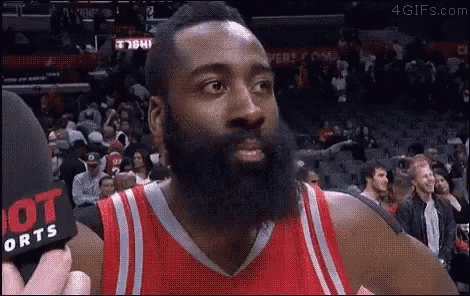 Basketball Player With Beard Being Interviewed In Red Jersey GIF