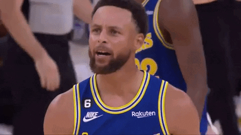 A Basketball Player With A Beard Is Wearing A Blue And Yellow Jersey With Rakuten On It . GIF