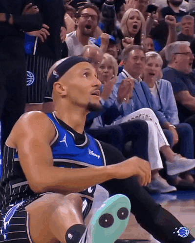 A Basketball Player With A Disney Logo On His Jersey GIF