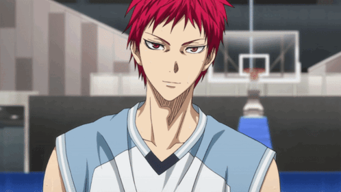 A Basketball Player With Red Hair Is Standing In Front Of A Basketball Net GIF