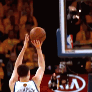 A Basketball Player With The Name Thompson On His Jersey Throws A Basketball GIF