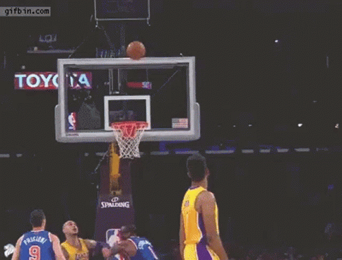 A Basketball Player With The Number 0 On His Jersey Is Jumping In The Air GIF