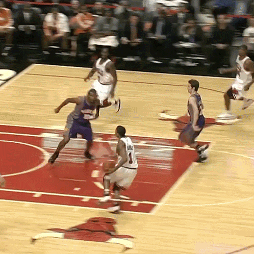 A Basketball Player With The Number 1 On His Jersey Is Dribbling The Ball GIF