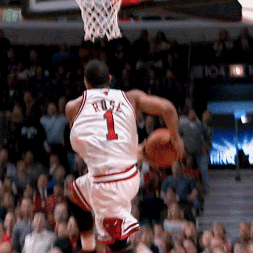 A Basketball Player With The Number 1 On His Jersey Is Jumping In The Air GIF