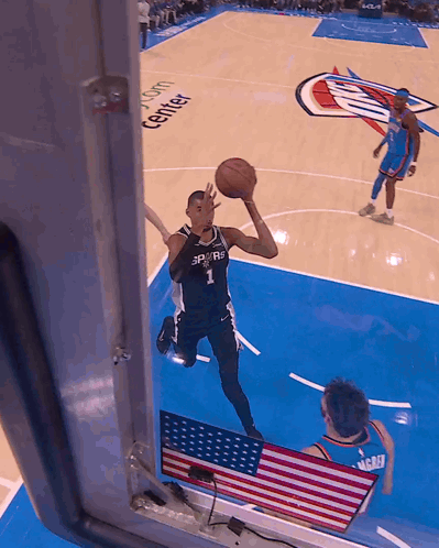 A Basketball Player With The Number 1 On His Jersey Is Jumping In The Air GIF