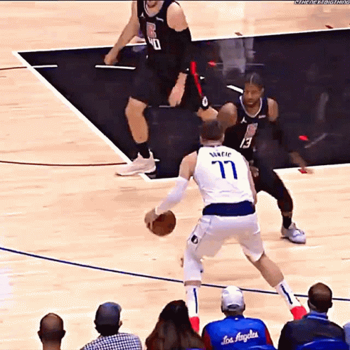 A Basketball Player With The Number 11 On His Back GIF