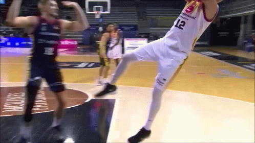 A Basketball Player With The Number 12 On His Shirt GIF