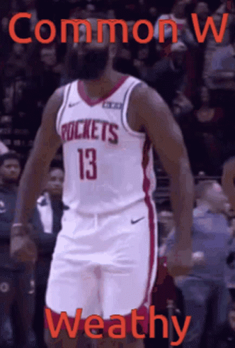 A Basketball Player With The Number 13 On His Jersey Is Standing In Front Of A Crowd GIF