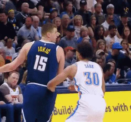 A Basketball Player With The Number 15 On His Back GIF