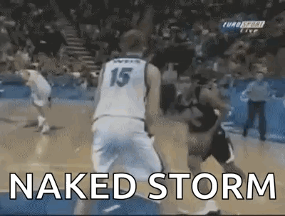 A Basketball Player With The Number 15 On His Jersey Is Dribbling The Ball . GIF