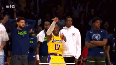 A Basketball Player With The Number 17 On His Jersey Stands In Front Of A Crowd GIF