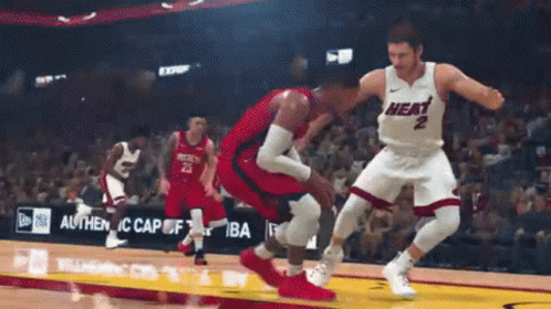 A Basketball Player With The Number 2 On His Jersey Is Jumping In The Air GIF