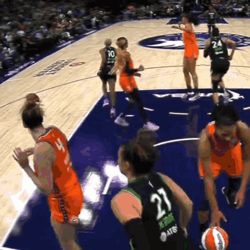 A Basketball Player With The Number 21 On Their Back GIF