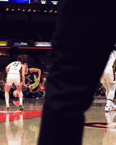 A Basketball Player With The Number 22 On The Back Of Her Jersey GIF