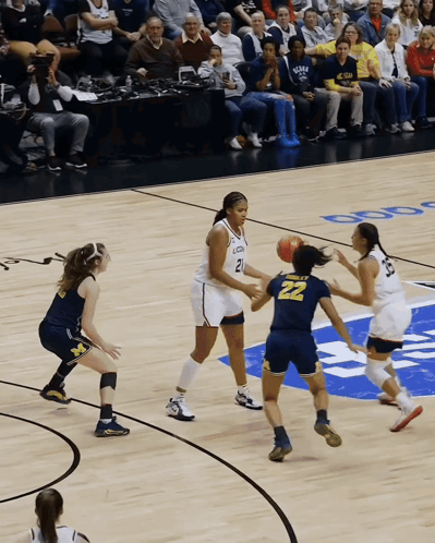 A Basketball Player With The Number 22 On The Back Of Her Shorts GIF