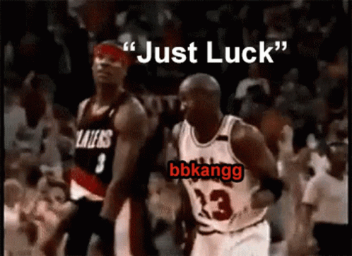 A Basketball Player With The Number 23 On His Jersey Is Running Towards Another Player GIF