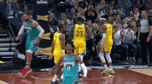 A Basketball Player With The Number 23 On The Back Of His Shirt GIF